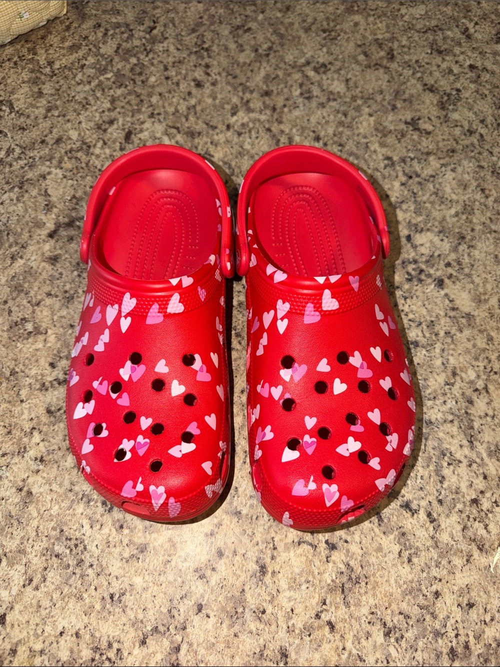 Red crocs with hearts
